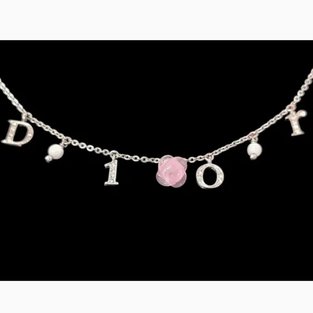 Christian Dior Silver Rose Motif and Rhinestone Logo
Bracelet - Picture 3 of 10